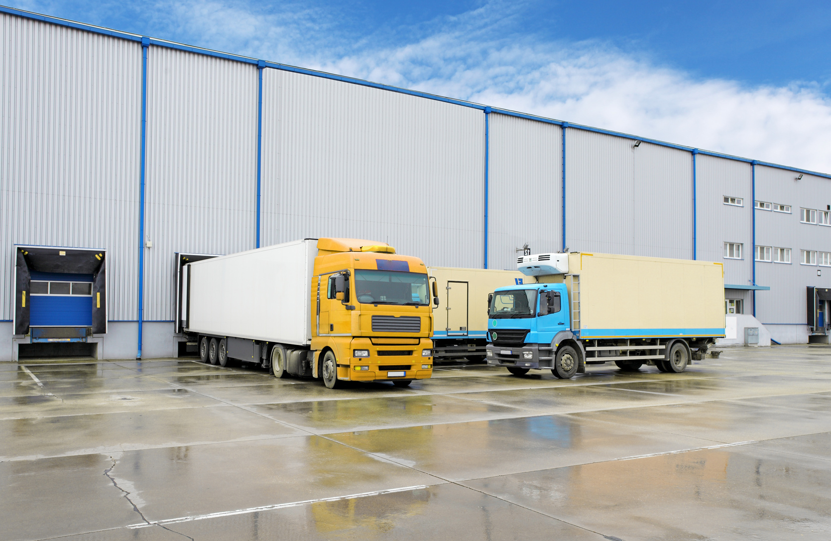 Trucks at a warehouse for cargo transport